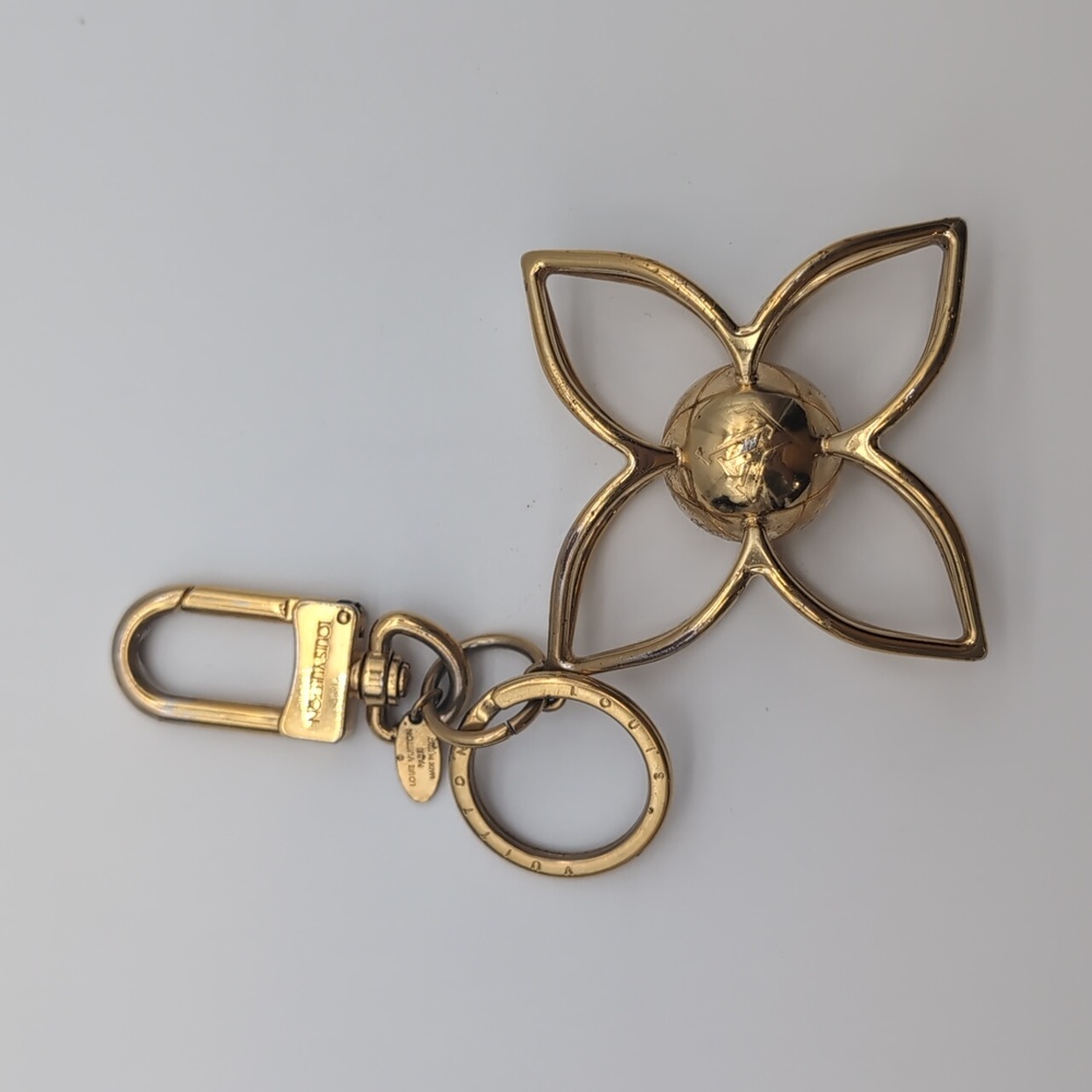 Louis Vuitton sphere key holder gold charm - Picture 1 of 4